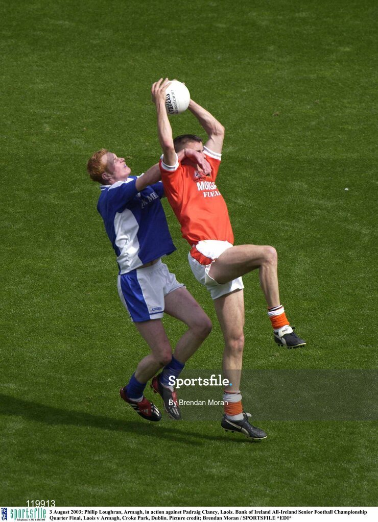 3 August 2003; Philip Loughran of Armagh in action against Padraig Clancy of Laois during the Bank of Ireland All-Ireland Senior Football Championship Quarter Final between Laois and Armagh at Croke Park in Dublin. Photo by Brendan Moran/Sportsfile
