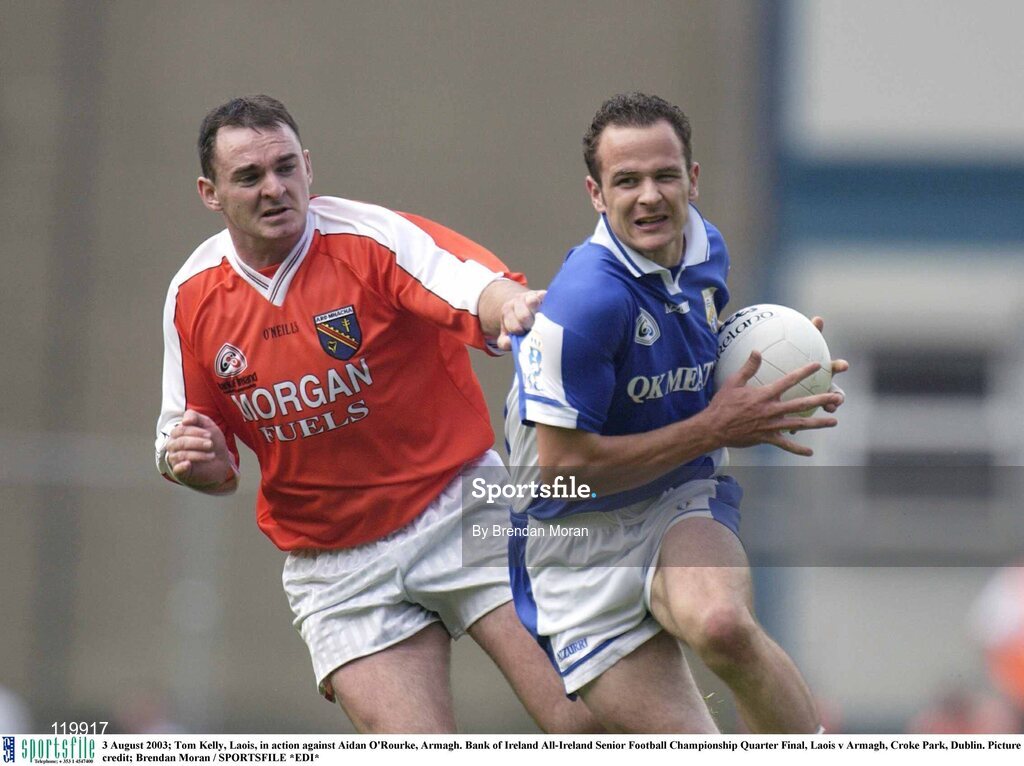 3 August 2003; Tom Kelly of Laois in action against Aidan O'Rourke of Armagh during the Bank of Ireland All-Ireland Senior Football Championship Quarter Final between Laois and Armagh at Croke Park in Dublin. Photo by Brendan Moran/Sportsfile