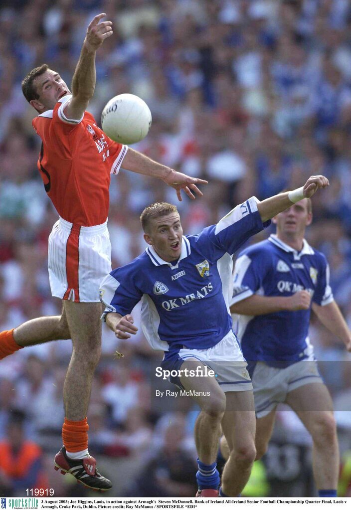 3 August 2003; Joe Higgins of Laois in action against Steven McDonnell of Armagh during the Bank of Ireland All-Ireland Senior Football Championship Quarter Final between Laois and Armagh at Croke Park in Dublin. Photo by Ray McManus/Sportsfile
