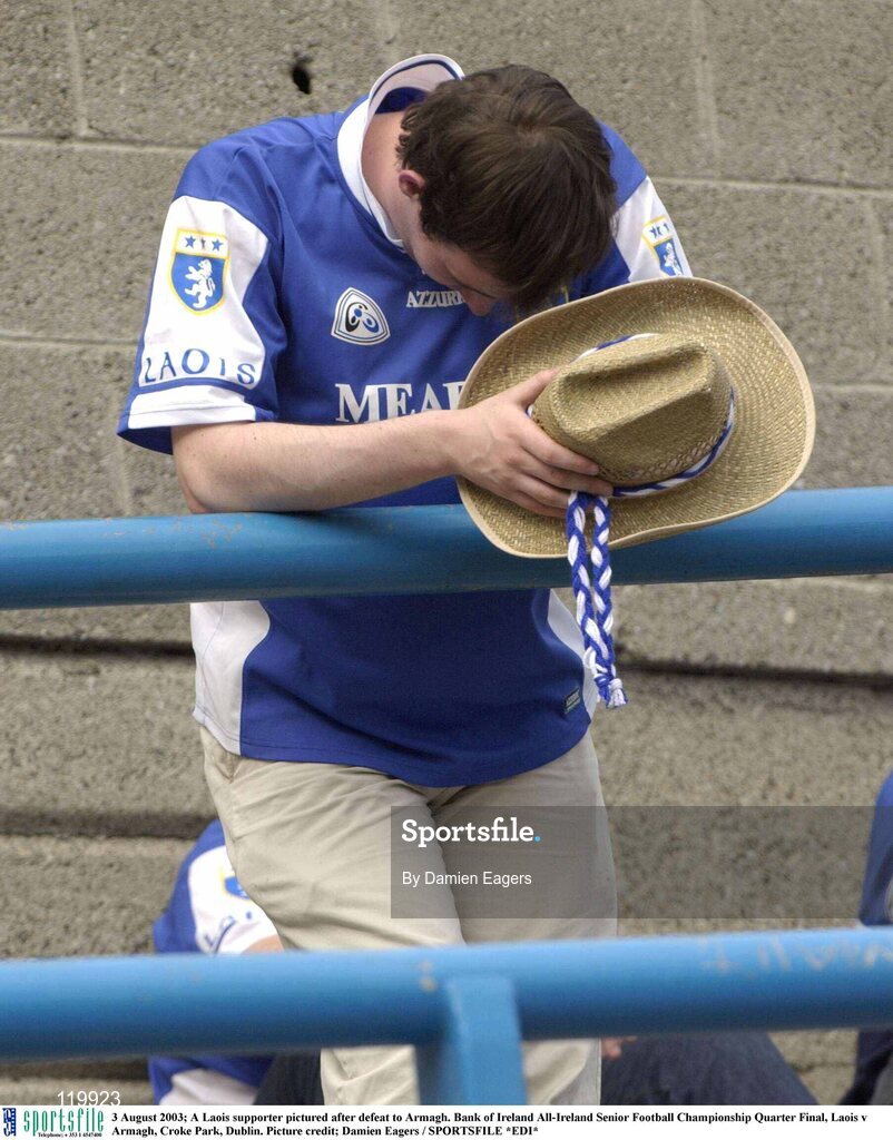 3 August 2003; A dejected Laois supporter after his sides defeat to Armagh in the Bank of Ireland All-Ireland Senior Football Championship Quarter Final between Laois and Armagh at Croke Park in Dublin. Photo by Damien Eagers/Sportsfile