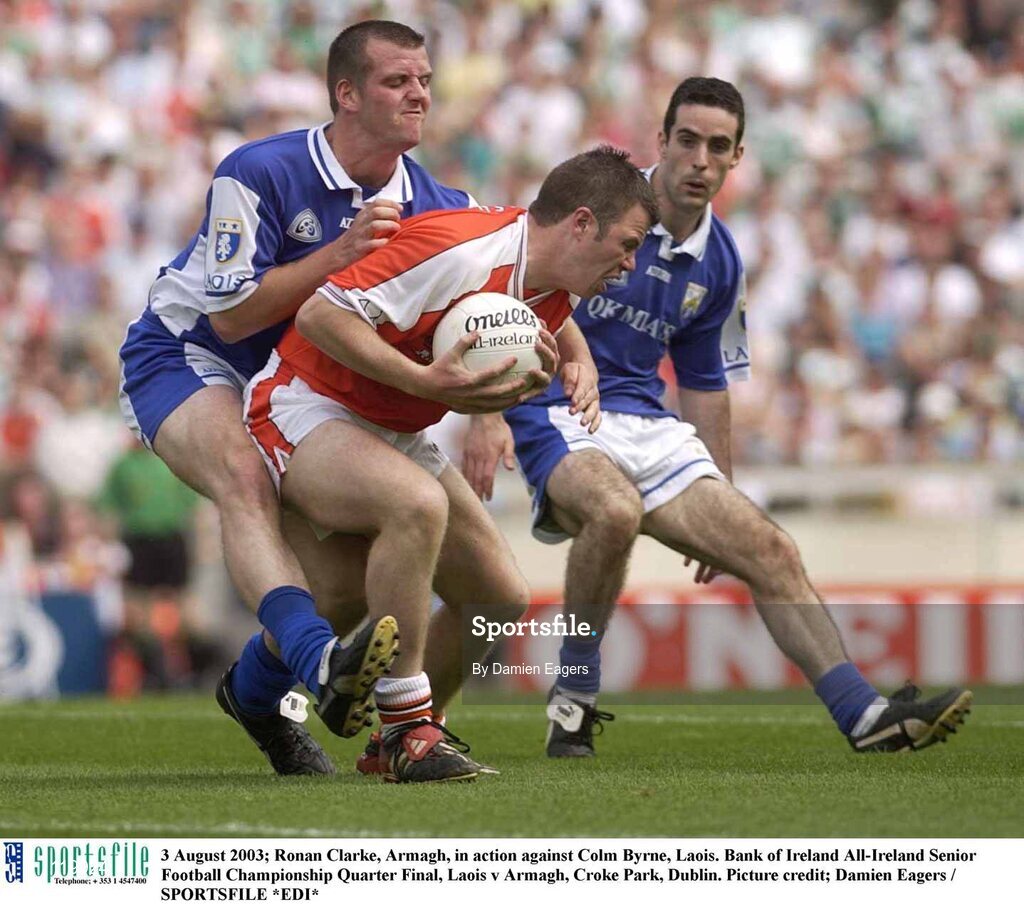 3 August 2003; Ronan Clarke of Armagh in action against Colm Byrne of Laois during the Bank of Ireland All-Ireland Senior Football Championship Quarter Final between Laois and Armagh at Croke Park in Dublin. Photo by Damien Eagers/Sportsfile