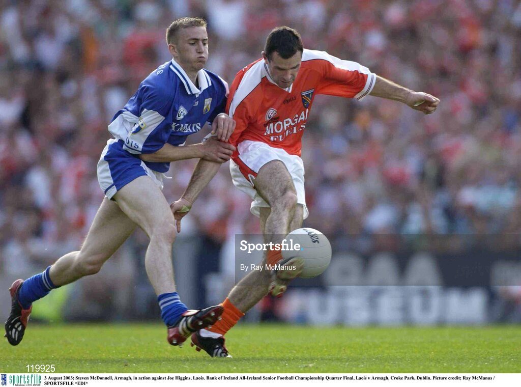 3 August 2003; Steven McDonnell of Armagh in action against Joe Higgins of Laois during the Bank of Ireland All-Ireland Senior Football Championship Quarter Final between Laois and Armagh at Croke Park in Dublin. Photo by Ray McManus/Sportsfile
