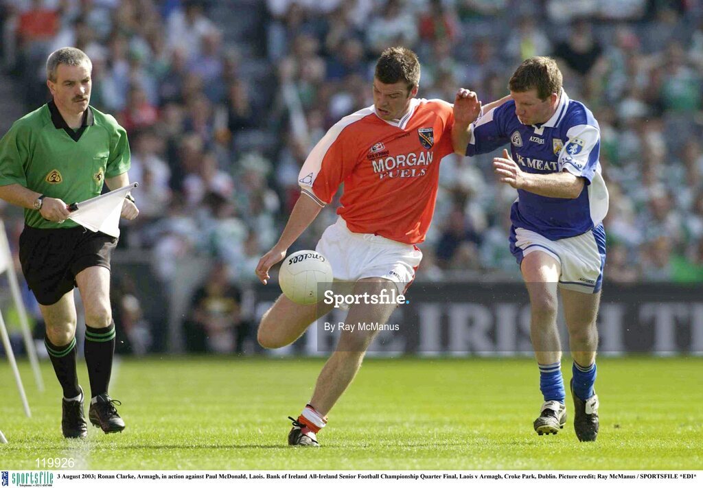 3 August 2003; Ronan Clarke of Armagh in action against Paul McDonald of Laois during the Bank of Ireland All-Ireland Senior Football Championship Quarter Final between Laois and Armagh at Croke Park in Dublin. Photo by Ray McManus/Sportsfile