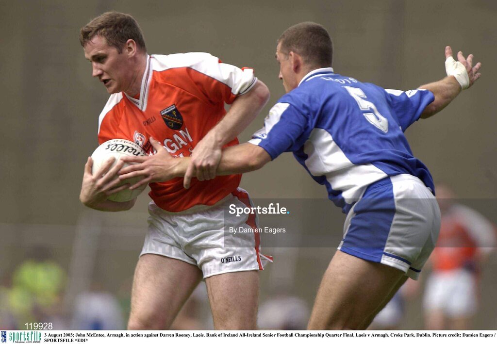 3 August 2003; John McEntee of Armagh in action against Darren Rooney of Laois during the Bank of Ireland All-Ireland Senior Football Championship Quarter Final between Laois and Armagh at Croke Park in Dublin. Photo by Damien Eagers/Sportsfile