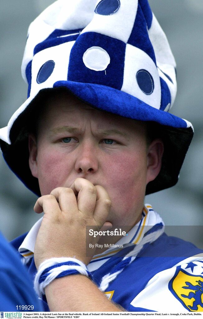3 August 2003; A dejected Laois fan at the final whistle of the Bank of Ireland All-Ireland Senior Football Championship Quarter Final between Laois and Armagh at Croke Park in Dublin. Photo by Ray McManus/Sportsfile