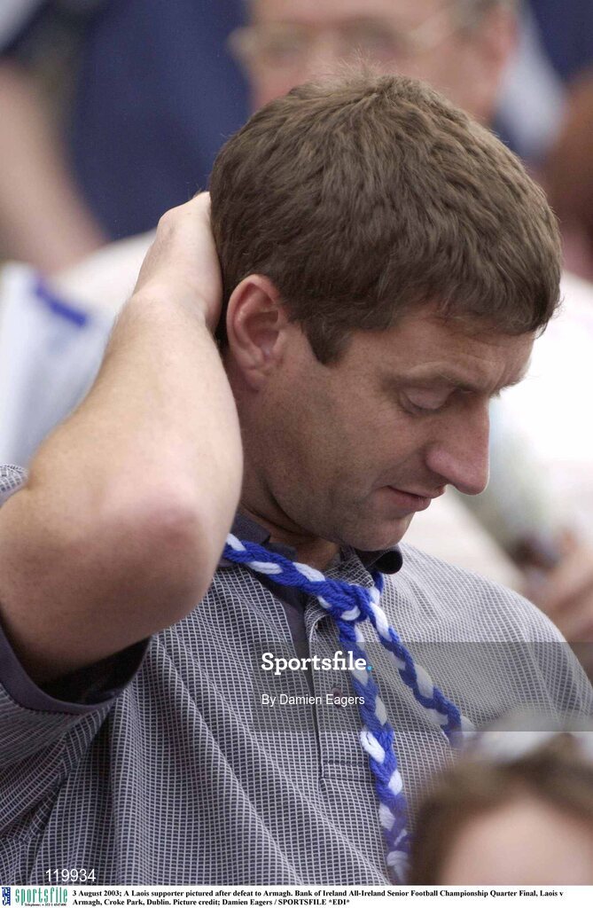 3 August 2003; A dejected Laois supporter after the Bank of Ireland All-Ireland Senior Football Championship Quarter Final between Laois and Armagh at Croke Park in Dublin. Photo by Damien Eagers/Sportsfile