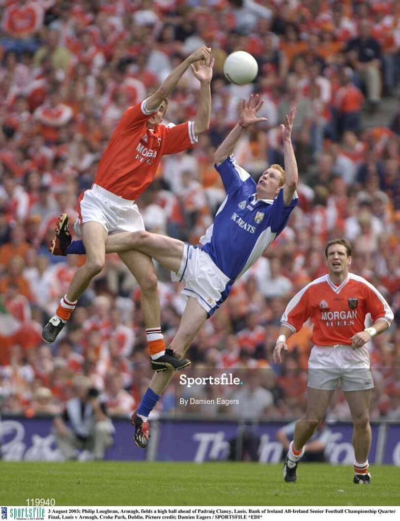 3 August 2003; Philip Loughran of Armagh fields a high ball ahead of Padraig Clancy of Laois during the Bank of Ireland All-Ireland Senior Football Championship Quarter Final between Laois and Armagh at Croke Park in Dublin. Photo by Damien Eagers/Sportsfile