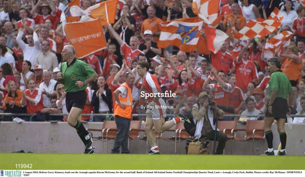 3 August 2003; Referee Gerry Kinneavy leads out the Armagh captain Kieran McGeeney for the second half of the Bank of Ireland All-Ireland Senior Football Championship Quarter Final between Laois and Armagh at Croke Park in Dublin. Photo by Ray McManus/Sportsfile