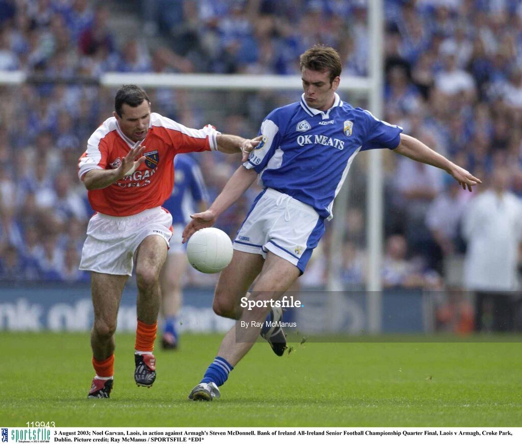3 August 2003; Noel Garvan of Laois and Steven McDonnell of Armagh during the Bank of Ireland All-Ireland Senior Football Championship Quarter Final between Laois and Armagh at Croke Park in Dublin. Photo by Ray McManus/Sportsfile