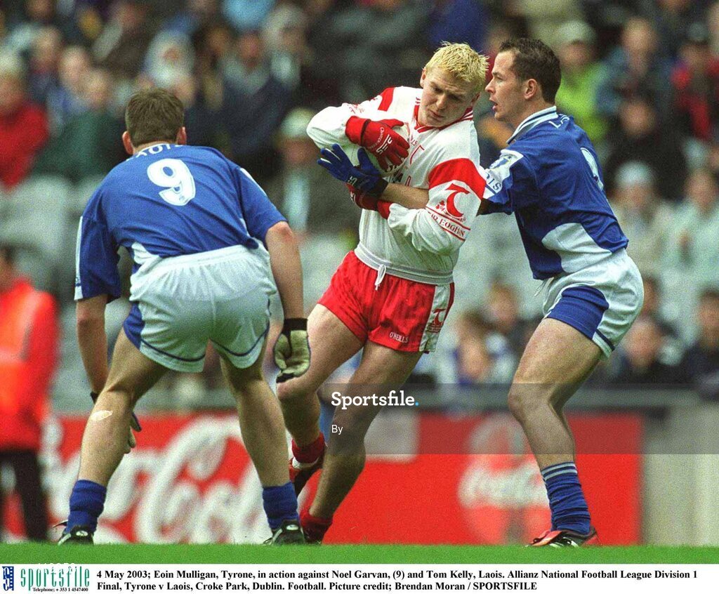 4 May 2003; Eoin Mulligan, Tyrone, in action against Noel Garvan, (9) and Tom Kelly, Laois. Allianz National Football League Division 1 Final, Tyrone v Laois, Croke Park, Dublin. Football. Picture credit; Brendan Moran / SPORTSFILE