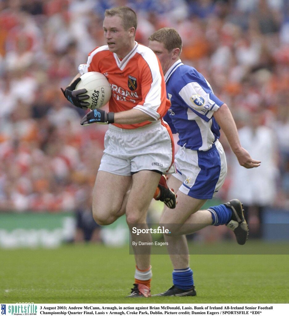 3 August 2003; Andrew McCann of Armagh in action against Brian McDonald of Laois during the Bank of Ireland All-Ireland Senior Football Championship Quarter Final between Laois and Armagh at Croke Park in Dublin. Photo by Damien Eagers/Sportsfile