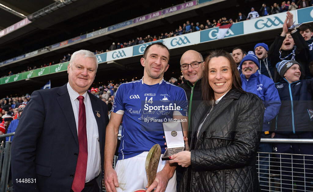 4 February 2018; Ann-Marie Freyne, AIB Local Market Leader, and Stephen Frampton, AIB Manager Finance & Leasing, alongside Uachtarán Chumann Lúthchleas Gael Aogán Ó Fearghail, present Séamus Prendergast of Ardmore with the Man of the Match award for his outstanding performance in the AIB GAA Hurling All-Ireland Junior Club Championship Final match between Fethard St. Mogues and Ardmore at Croke Park in Dublin on Sunday, February 4th. For exclusive content and behind the scenes action follow AIB GAA on Facebook, Twitter, Instagram, Snapchat and on www.aib.ie/gaa. Croke Park in Dublin. Photo by Piaras Ó Mídheach/Sportsfile