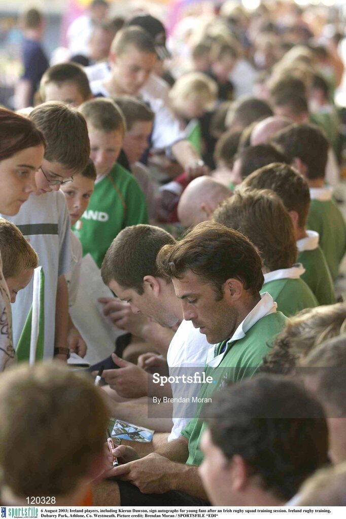 6 August 2003; Ireland players, including Kieron Dawson, sign autographs for young fans after an Irish rugby squad training session at Dubarry Park, Athlone, Co. Westmeath.