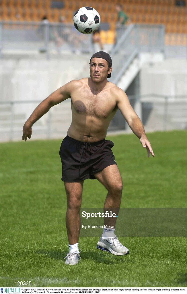 6 August 2003; Kieron Dawson tests his skills with a soccer ball during an Irish rugby squad training session at Dubarry Park, Athlone, Co. Westmeath. Photo by Brendan Moran/Sportsfile