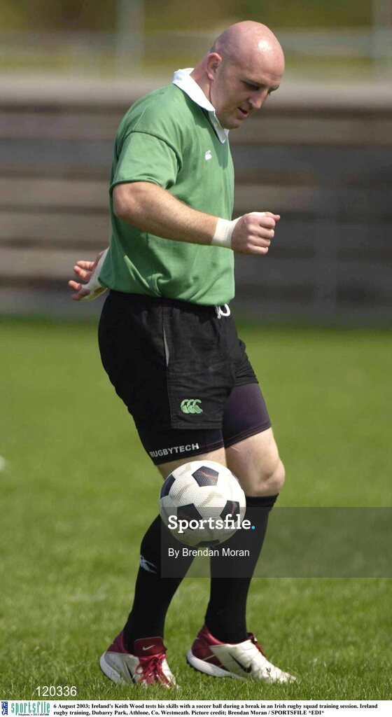 6 August 2003; Keith Wood tests his skills with a soccer ball during an Irish rugby squad training session at Dubarry Park, Athlone, Co. Westmeath. Photo by Brendan Moran/Sportsfile
