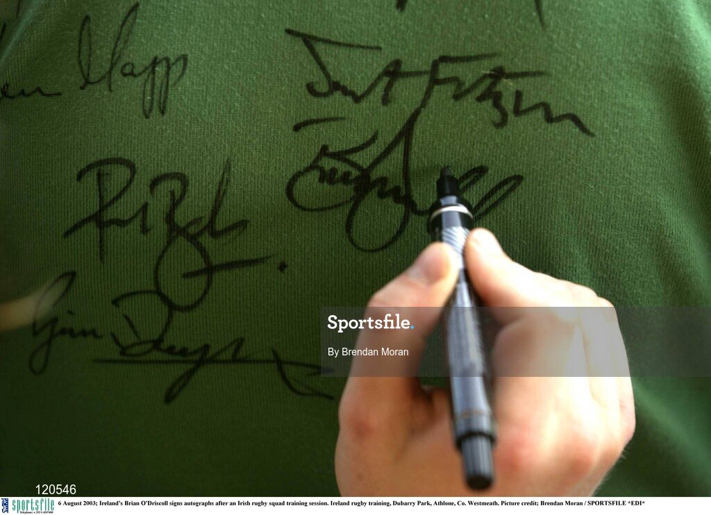 6 August 2003; Brian O'Driscoll signs autographs after an Irish rugby squad training session at Dubarry Park, Athlone, Co. Westmeath. Photo by Brendan Moran/Sportsfile