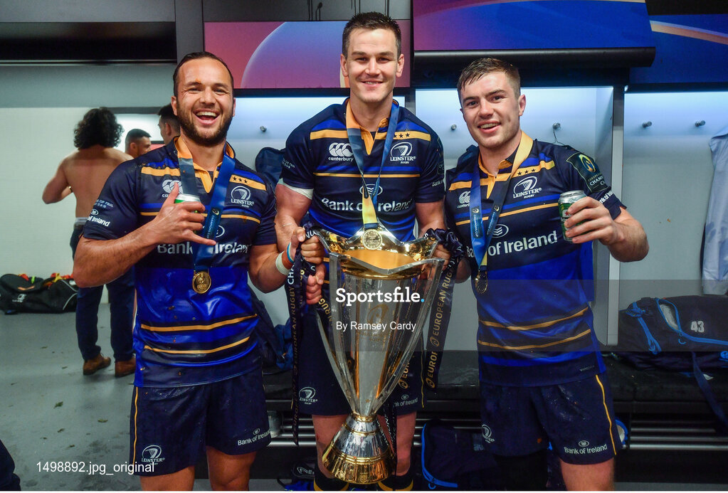 12 May 2018; From left, Jamison Gibson-Park, Jonathan Sexton and Luke McGrath celebrate with the cup in the dressing room after the European Rugby Champions Cup Final match between Leinster and Racing 92 at the San Mames Stadium in Bilbao, Spain. Photo by Ramsey Cardy/Sportsfile