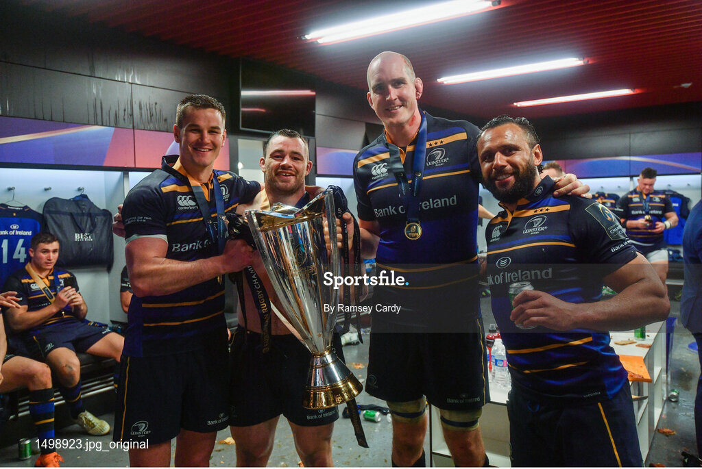 12 May 2018; From left, Jonathan Sexton with Cian Healy, Devin Toner and Isa Nacewa celebrate with the cup in the dressing room after the European Rugby Champions Cup Final match between Leinster and Racing 92 at the San Mames Stadium in Bilbao, Spain. Photo by Ramsey Cardy/Sportsfile