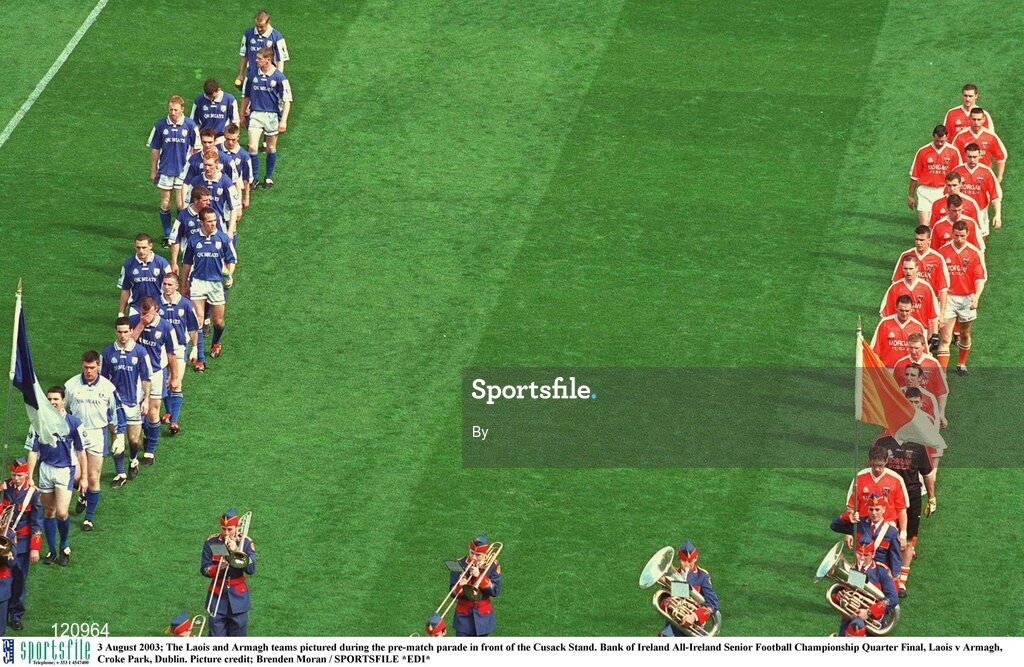 3 August 2003; The Laois and Armagh teams pictured during the pre-match parade in front of the Cusack Stand. Bank of Ireland All-Ireland Senior Football Championship Quarter Final, Laois v Armagh, Croke Park, Dublin. Picture credit; Brenden Moran / SPORTSFILE *EDI*