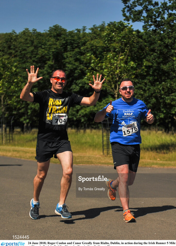 24 June 2018; Roger Conlon and Conor Greally from Rialto, Dublin, in action during the Irish Runner 5 Mile at Phoenix Park in Dublin. Photo by Tomás Greally/Sportsfile