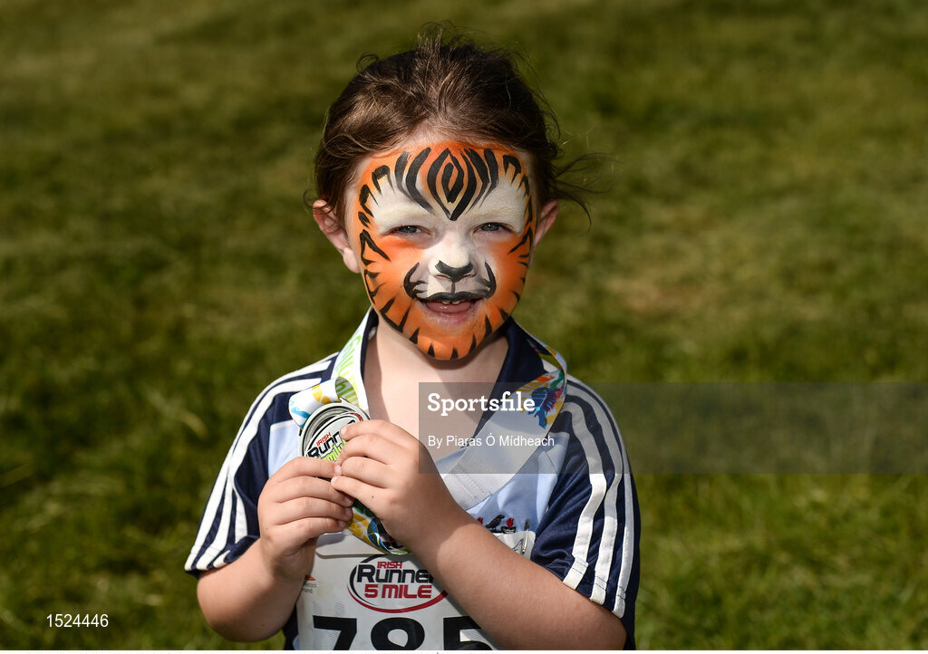 24 June 2018; Aisling Kinsella, age 4, from Garristown, after competing in the Irish Runner 5 Mile at the Phoenix Park in Dublin. Photo by Piaras Ó Mídheach/Sportsfile