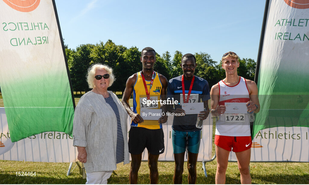 24 June 2018; Athletics Ireland president Georgina Drumm with men's runners, Eskander Turki of Monaghan Town Runners, 3rd place, Freddie Keron, Raheny Shamrocks, 1st place, Brendan McDonnell, 2nd place, after the Irish Runner 5 Mile at the Phoenix Park in Dublin. Photo by Piaras Ó Mídheach/Sportsfile