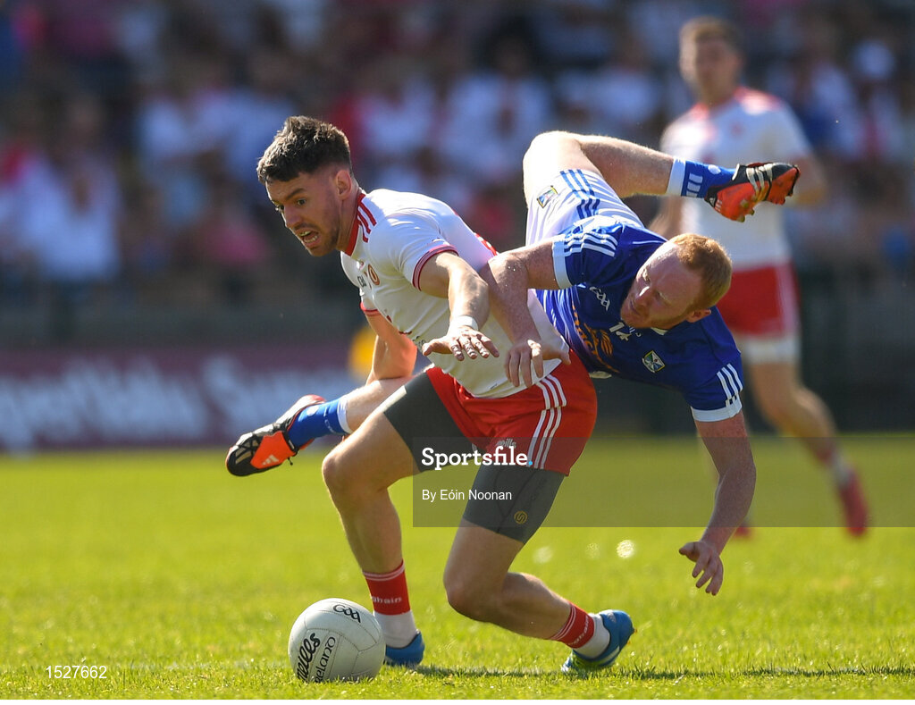 30 June 2018; Matthew Donnelly of Tyrone in action against Cian Mackey of Cavan during the GAA Football All-Ireland Senior Championship Round 3 match between Cavan and Tyrone at Brewster Park in Enniskillen, Fermanagh. Photo by Eóin Noonan/Sportsfile