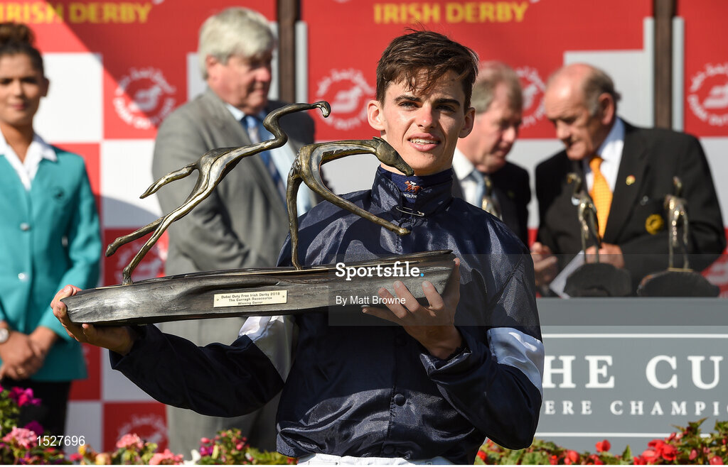 30 June 2018; Jockey Donnacha O'Brien with the trophy after winning the Dubai Duty Free Irish Derby on Latrobe during day 2 of the Dubai Duty Free Irish Derby Festival at the Curragh Racecourse in Kildare. Photo by Matt Browne/Sportsfile