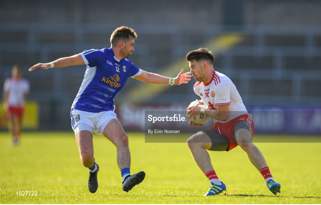 30 June 2018; Matthew Donnelly of Tyrone in action against Niall Murray of Cavan  during the GAA Football All-Ireland Senior Championship Round 3 match between Cavan and Tyrone at Brewster Park in Enniskillen, Fermanagh. Photo by Eóin Noonan/Sportsfile