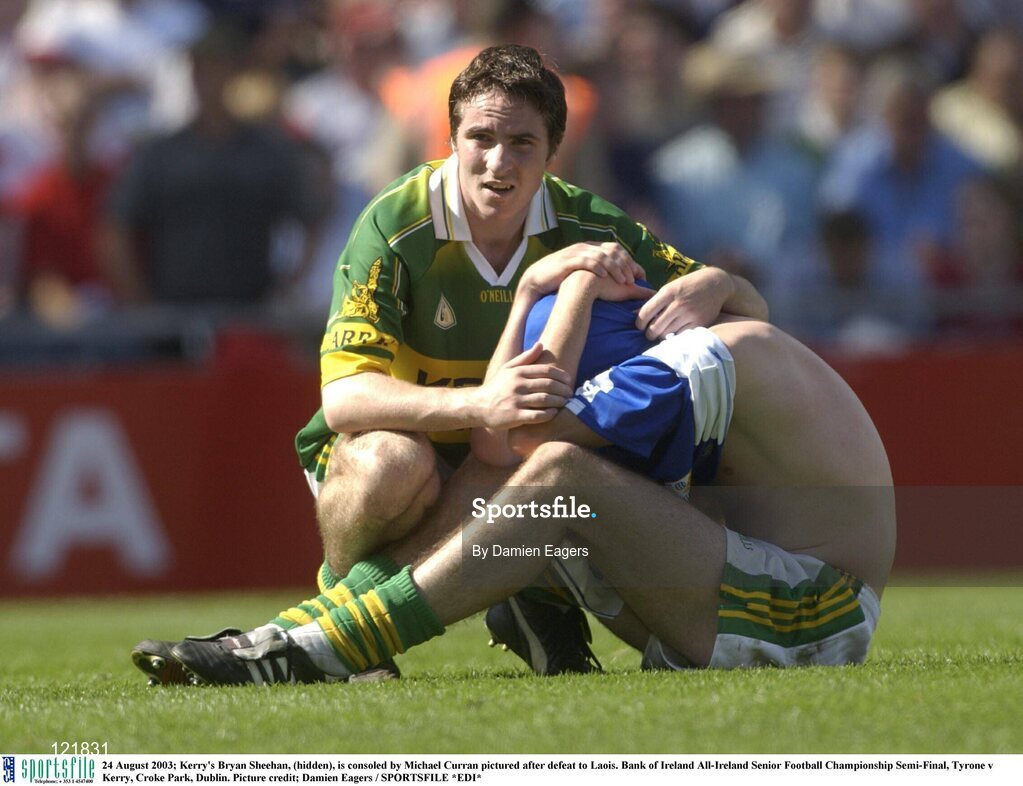 24 August 2003; Bryan Sheehan, hidden, of Kerry, is consoled by Michael Curran pictured after defeat to Laois in the Bank of Ireland All-Ireland Minor Football Championship Semi-Final between Laois and Kerry at Croke Park, Dublin. Photo by Damien Eagers/Sportsfile