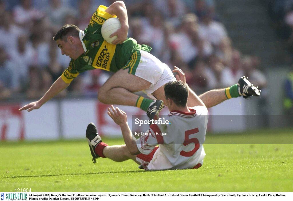 24 August 2003; Declan O'Sullivan of Kerry is tripped Conor Gormley of Tyrone during the Bank of Ireland All-Ireland Senior Football Championship Semi-Final between Tyrone and Kerry at Croke Park, Dublin. Photo by Damien Eagers/Sportsfile
