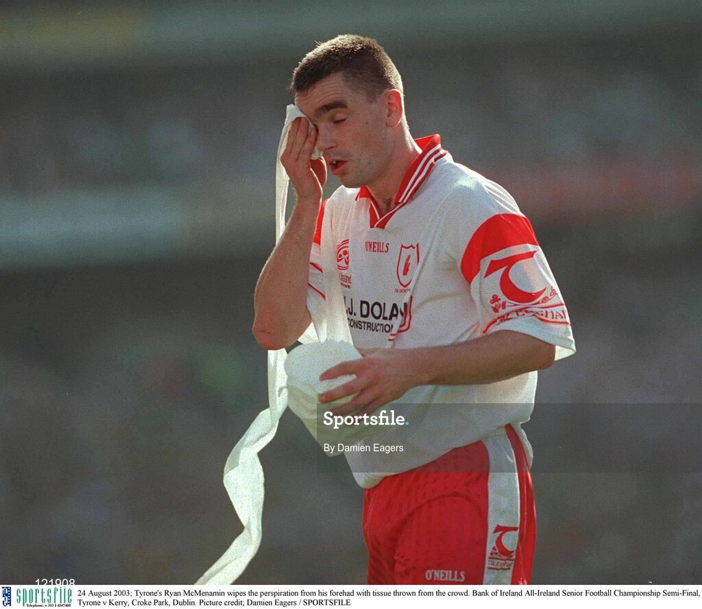 24 August 2003; Ryan McMenamin of Tyrone wipes the perspiration from his forehead with tissue thrown from the crowd during the Bank of Ireland All-Ireland Senior Football Championship Semi-Final between Tyrone and Kerry at Croke Park, Dublin. Photo by Damien Eagers/Sportsfile