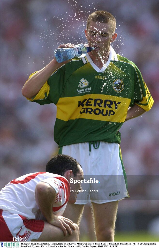 24 August 2003; Brian Dooher of Tyrone, looks on as Marc O'Se of Kerry takes a drink during the Bank of Ireland All-Ireland Senior Football Championship Semi-Final between Tyrone and Kerry at Croke Park, Dublin. Photo by Damien Eagers/Sportsfile