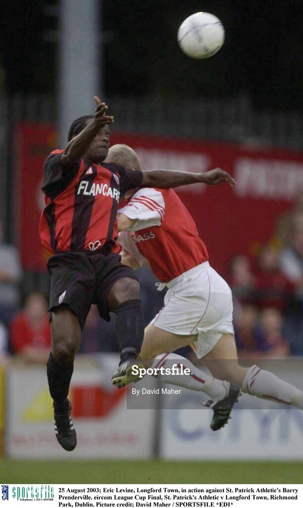 25 August 2003; Eric Levine of Longford Town, in action against Barry Prenderville of St. Patrick's Athletic during the Eircom League Cup Final between St. Patrick's Athletic and Longford Town at Richmond Park, Dublin. Photo by David Maher/Sportsfile