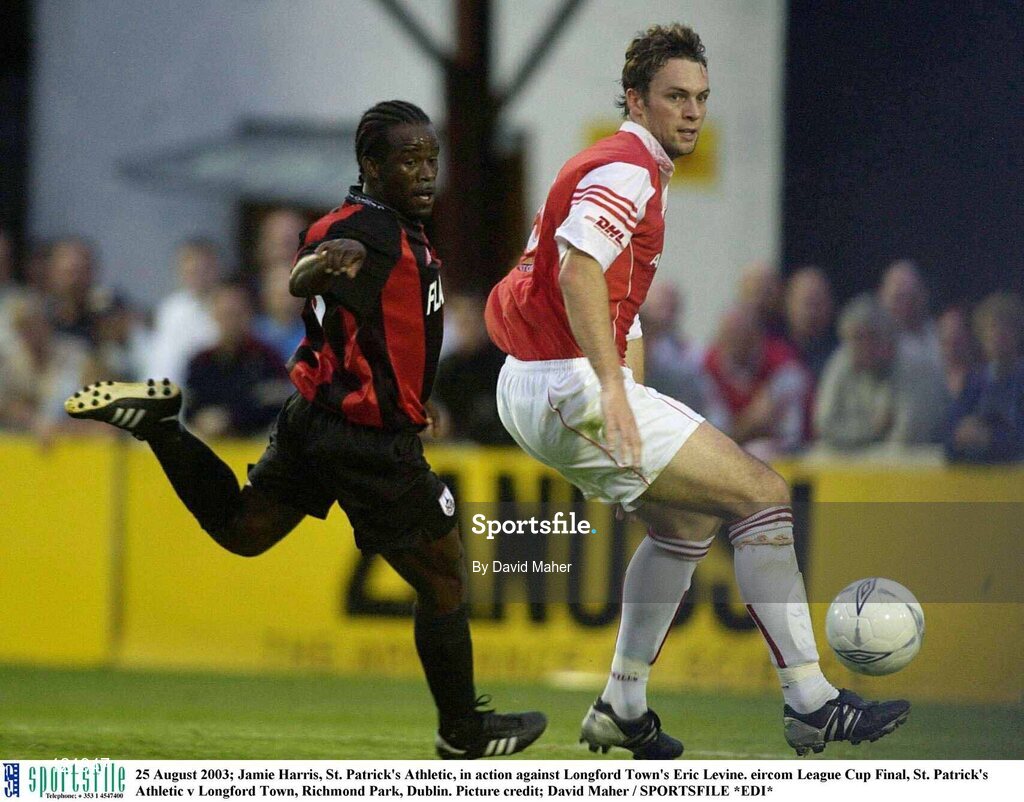 25 August 2003; Jamie Harris of St. Patrick's Athletic, in action against Eric Levine of Longford Town during the Eircom League Cup Final between St. Patrick's Athletic and Longford Town at Richmond Park, Dublin. Photo by David Maher/Sportsfile