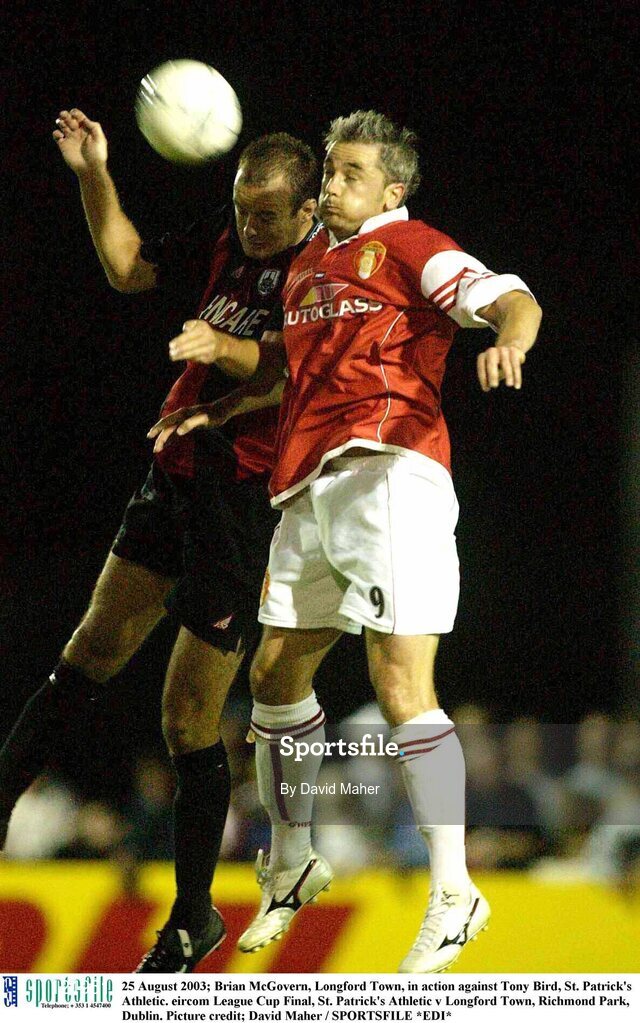 25 August 2003; Brian McGovern, left, of Longford Town, in action against Tony Bird, right, of St. Patrick's Athletic during the Eircom League Cup Final between St. Patrick's Athletic and Longford Town at Richmond Park, Dublin. Photo by David Maher/Sportsfile