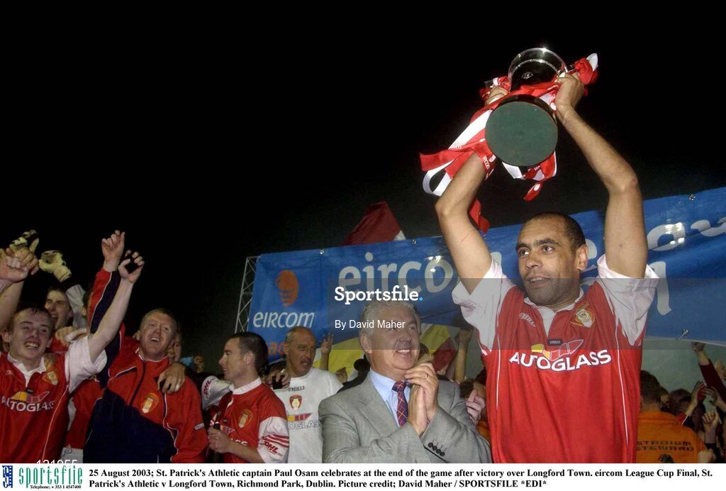 25 August 2003; Paul Osam captain of St. Patrick's Athletic, celebrates at the end of the game after victory over Longford Town in the Eircom League Cup Final between St. Patrick's Athletic and Longford Town at Richmond Park, Dublin. Photo by David Maher/Sportsfile