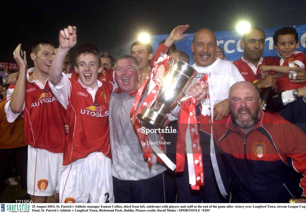 25 August 2003; St. Patrick's Athletic manager Eamon Collins, third from left, celebrates with players and staff at the end of the game after victory over Longford Town after the eircom League Cup Final between St. Patrick's Athletic and Longford Town at Richmond Park, Dublin. Photo by David Maher/Sportsfile