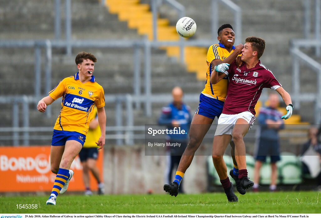29 July 2018; Aidan Halloran of Galway in action against Chibby Okoye of Clare during the Electric Ireland GAA Football All-Ireland Minor Championship Quarter-Final between Galway and Clare at Bord Na Mona O'Connor Park in Tullamore, Co Offaly. Photo by Harry Murphy/Sportsfile