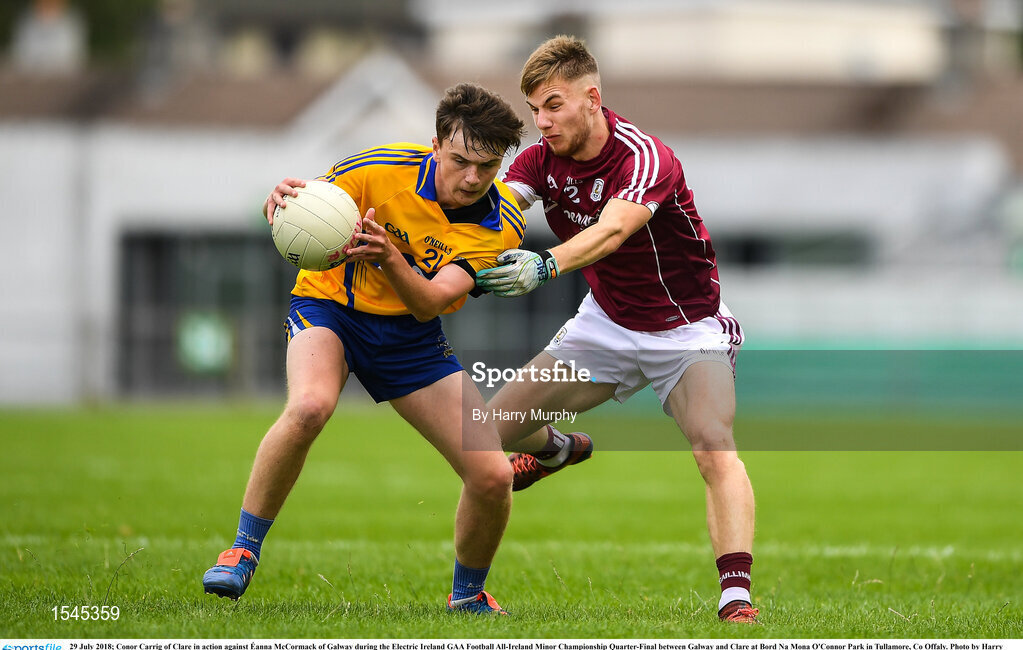 29 July 2018; Conor Carrig of Clare in action against Éanna McCormack of Galway during the Electric Ireland GAA Football All-Ireland Minor Championship Quarter-Final between Galway and Clare at Bord Na Mona O'Connor Park in Tullamore, Co Offaly. Photo by Harry Murphy/Sportsfile