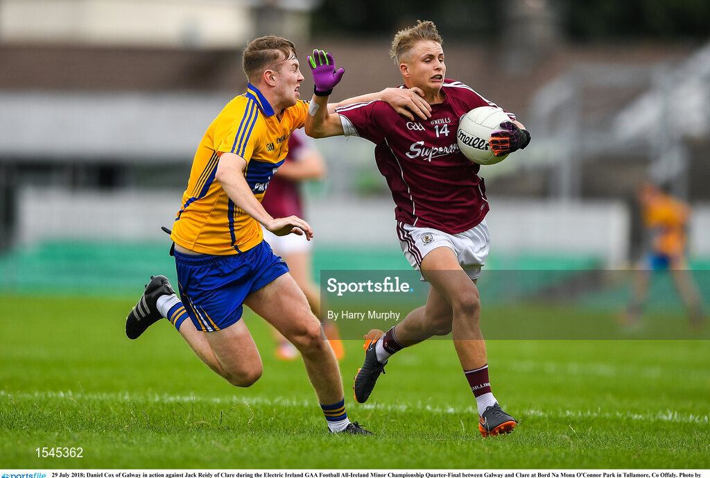 29 July 2018; Daniel Cox of Galway in action against Jack Reidy of Clare during the Electric Ireland GAA Football All-Ireland Minor Championship Quarter-Final between Galway and Clare at Bord Na Mona O'Connor Park in Tullamore, Co Offaly. Photo by Harry Murphy/Sportsfile