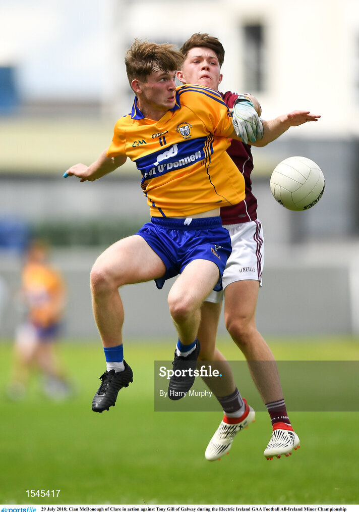 29 July 2018; Cian McDonough of Clare in action against Tony Gill of Galway during the Electric Ireland GAA Football All-Ireland Minor Championship Quarter-Final between Galway and Clare at Bord Na Mona O'Connor Park in Tullamore, Co Offaly. Photo by Harry Murphy/Sportsfile