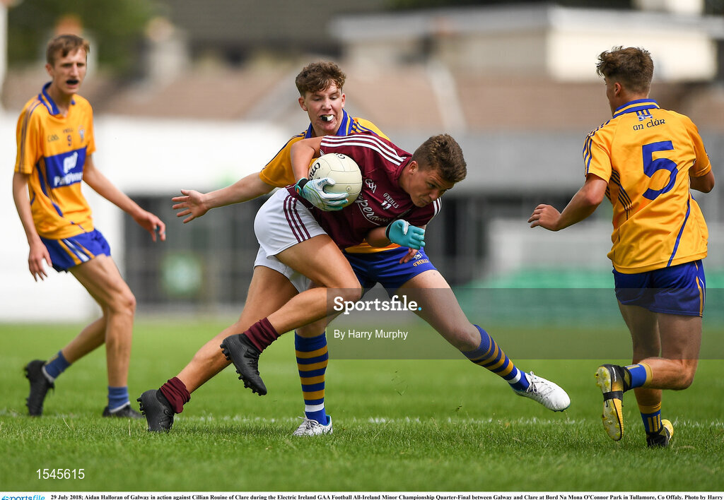 29 July 2018; Aidan Halloran of Galway in action against Cillian Rouine of Clare during the Electric Ireland GAA Football All-Ireland Minor Championship Quarter-Final between Galway and Clare at Bord Na Mona O'Connor Park in Tullamore, Co Offaly. Photo by Harry Murphy/Sportsfile