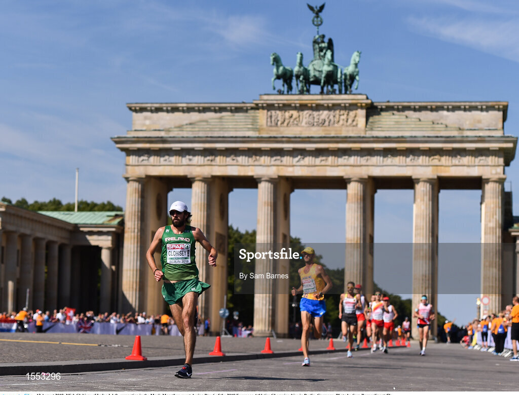 12 August 2018; Mick Clohisey of Ireland, left, passes in front the Brandenburg Gate while competing in the Men's Marathon event during Day 6 of the 2018 European Athletics Championships in Berlin, Germany. Photo by Sam Barnes/Sportsfile