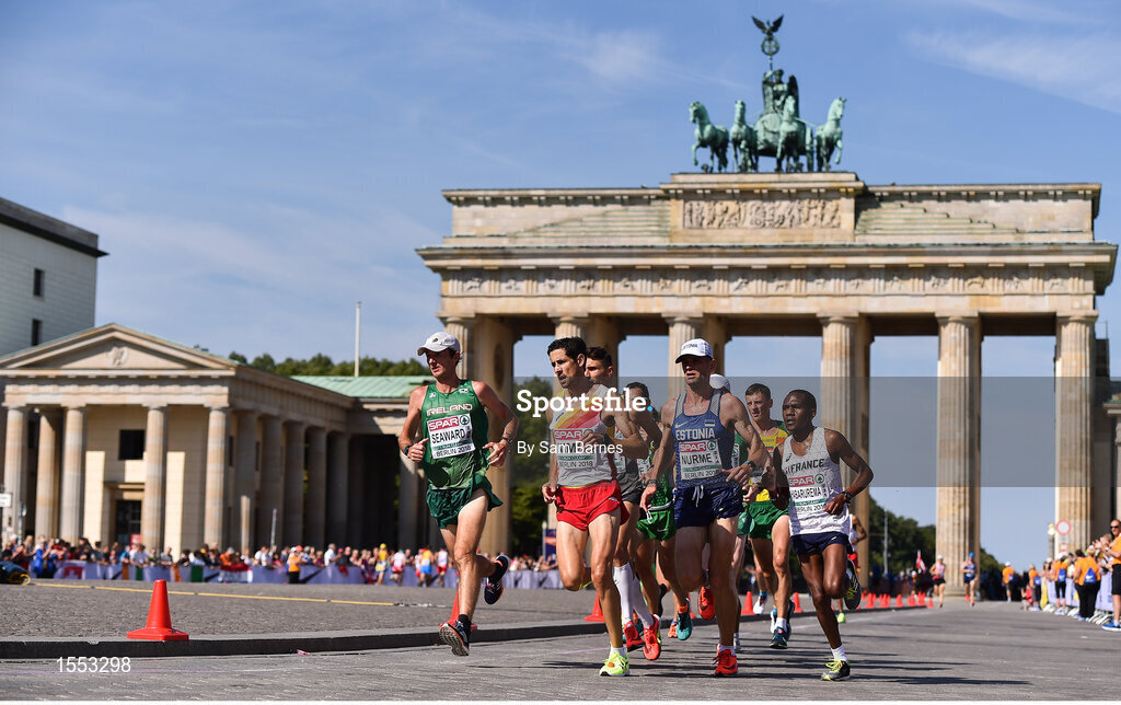 12 August 2018; Kevin Seaward of Ireland, left, passes in front of the Brandenburg Gate while competing in the Men's Marathon event during Day 6 of the 2018 European Athletics Championships in Berlin, Germany. Photo by Sam Barnes/Sportsfile