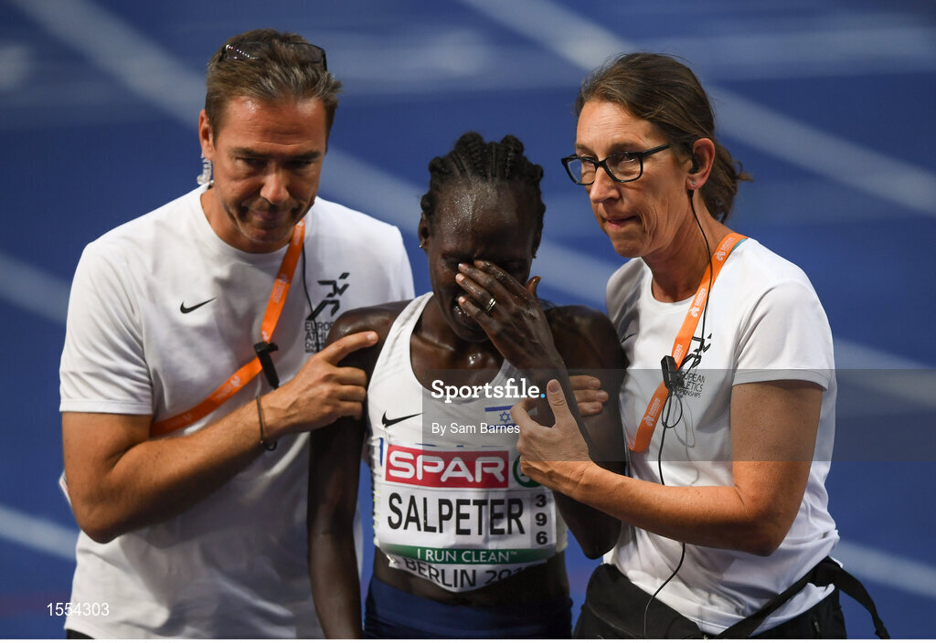 12 August 2018;A dejected Lonah Chemtai Salpeter of Israel is helped from the track after she celebrated a lap prematurely during the Women's 5000m final during Day 6 of the 2018 European Athletics Championships at The Olympic Stadium in Berlin, Germany. Photo by Sam Barnes/Sportsfile