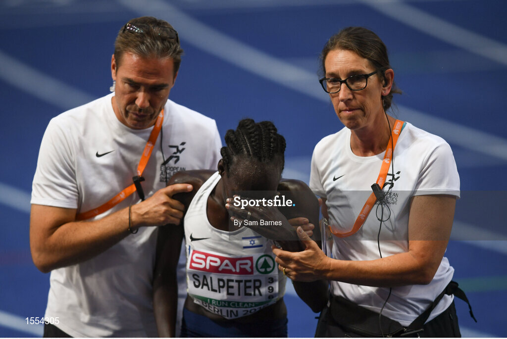 12 August 2018;A dejected Lonah Chemtai Salpeter of Israel is helped from the track after she celebrated a lap prematurely during the Women's 5000m final during Day 6 of the 2018 European Athletics Championships at The Olympic Stadium in Berlin, Germany. Photo by Sam Barnes/Sportsfile