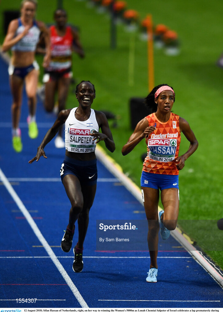 12 August 2018; Sifan Hassan of Netherlands, right, on her way to winning the Women's 5000m as Lonah Chemtai Salpeter of Israel celebrates a lap prematurely during Day 6 of the 2018 European Athletics Championships at The Olympic Stadium in Berlin, Germany. Photo by Sam Barnes/Sportsfile