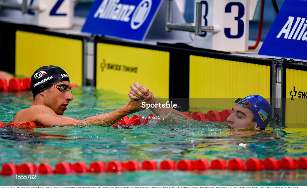 14 August 2018; Maksym Krypak, right, of Ukraine is congratulated by Stefano Raimondi of Italy, who finished second, after winning the Men's 100m Backstroke S10 Final event during day two of the World Para Swimming Allianz European Championships at the Sport Ireland National Aquatic Centre in Blanchardstown, Dublin. Photo by Seb Daly/Sportsfile