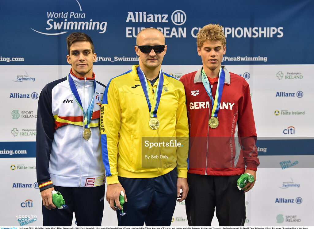 14 August 2018; Medallists in the Men's 100m Breaststroke SB11 Final, from left, silver medallist Israel Oliver of Spain, gold medallist Viktor Smyrnov of Ukrinae, and bronze medallist Johannes Weinberg of Germany, during day two of the World Para Swimming Allianz European Championships at the Sport Ireland National Aquatic Centre in Blanchardstown, Dublin.  Photo by Seb Daly/Sportsfile